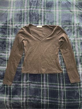 Black Mangopop long sleeve top with v neck. Size S.